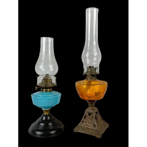 90 - 2 Victorian oil lamps. Largest 49cm