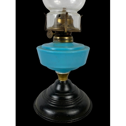 90 - 2 Victorian oil lamps. Largest 49cm