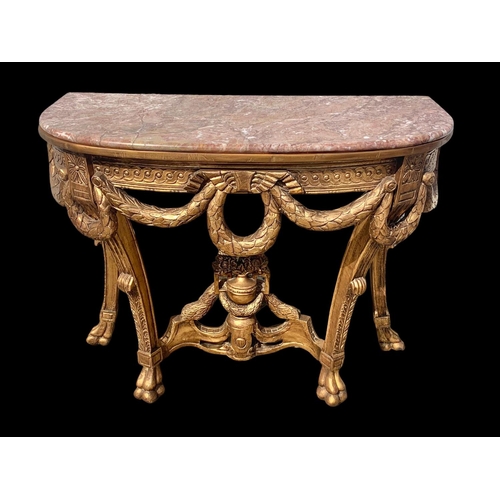 931 - A Regency style gilt marble top console table. 103 x 48 x 81cm.