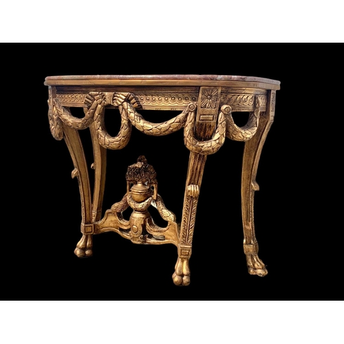 931 - A Regency style gilt marble top console table. 103 x 48 x 81cm.