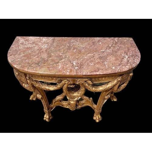 931 - A Regency style gilt marble top console table. 103 x 48 x 81cm.