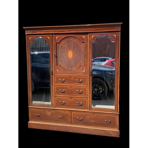 933 - A large Edwardian inlaid wardrobe. 189.5 x 54 x 208.5cm