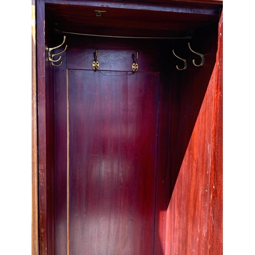 933 - A large Edwardian inlaid wardrobe. 189.5 x 54 x 208.5cm