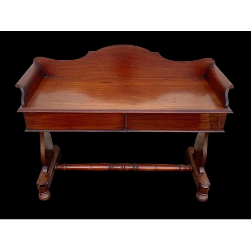 940 - A Victorian mahogany 2 drawer washstand/ gallery back side table. 122 x 51 x 99.5cm.