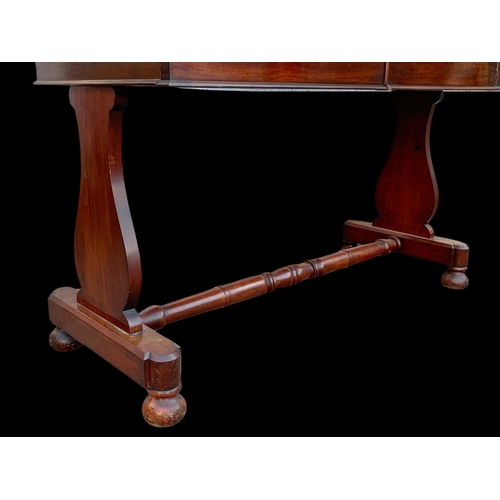 940 - A Victorian mahogany 2 drawer washstand/ gallery back side table. 122 x 51 x 99.5cm.