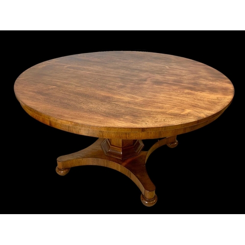 944 - A large William IV rosewood tilt top breakfast table. 136 x 73.5cm.