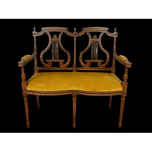 946 - A 3 piece French 18th century style parlour suite with lyre decoration Sofa measures 93cm