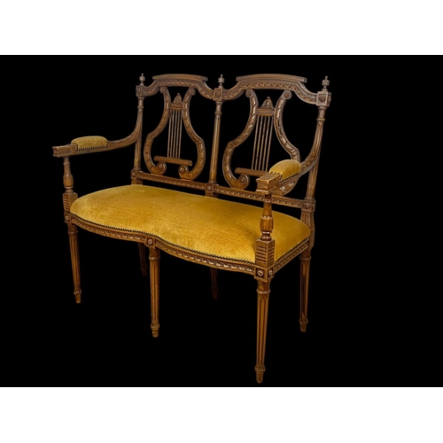 946 - A 3 piece French 18th century style parlour suite with lyre decoration Sofa measures 93cm