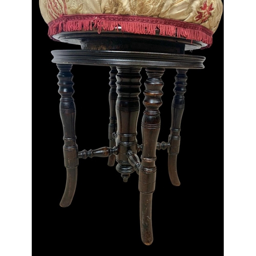 969 - An Edwardian piano stool.