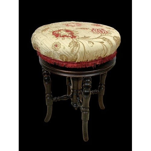 969 - An Edwardian piano stool.