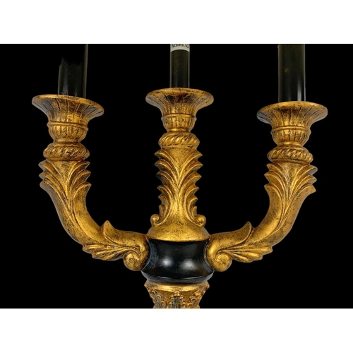 97 - An ornate gilt lamp. 69cm including shade