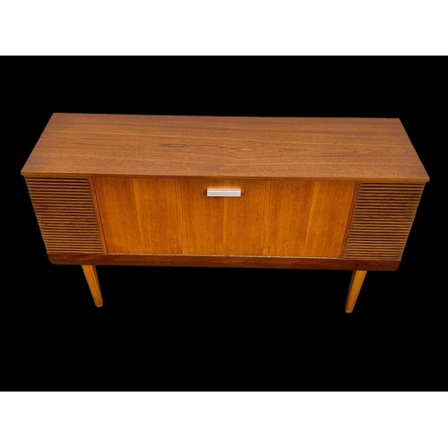 970 - A teak radiogram by Alba. 116 x 33 x 64cm.