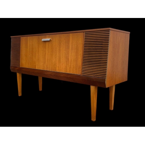 970 - A teak radiogram by Alba. 116 x 33 x 64cm.