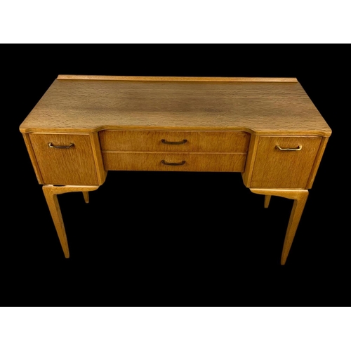 972 - A vintage writing desk by Lebus Furniture. 108x44x77.5cm