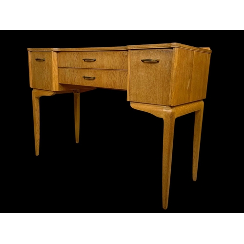 972 - A vintage writing desk by Lebus Furniture. 108x44x77.5cm