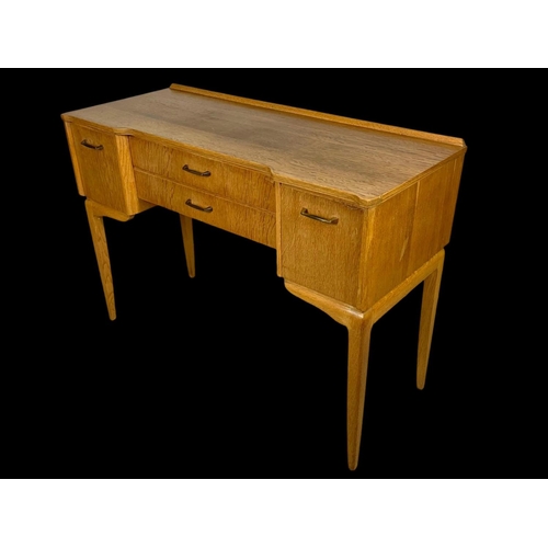 972 - A vintage writing desk by Lebus Furniture. 108x44x77.5cm