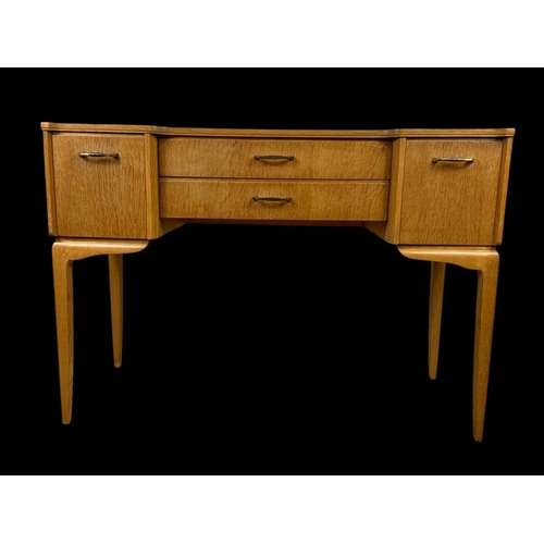 972 - A vintage writing desk by Lebus Furniture. 108x44x77.5cm