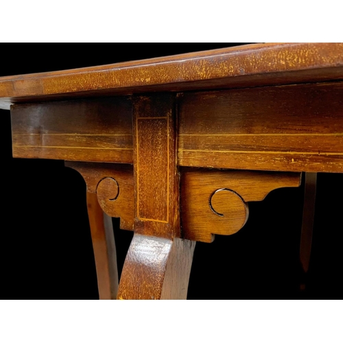 976 - An Edwardian inlaid window table. 72 x 72 x 71cm.