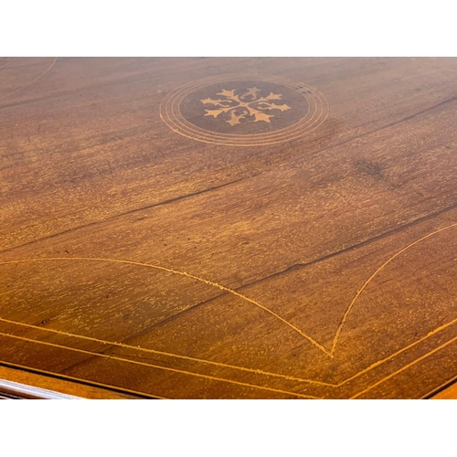 976 - An Edwardian inlaid window table. 72 x 72 x 71cm.