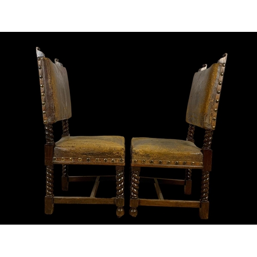 977 - A pair of late 19th century oak rectory chairs in the Jacobean style with original leather and eccle... 