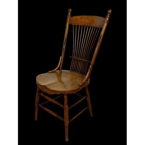 986 - A late 19th century American oak stick back kitchen chair. Circa 1880-1890.