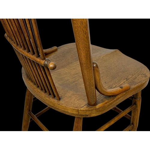 986 - A late 19th century American oak stick back kitchen chair. Circa 1880-1890.