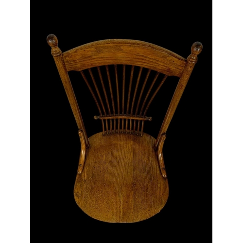 986 - A late 19th century American oak stick back kitchen chair. Circa 1880-1890.