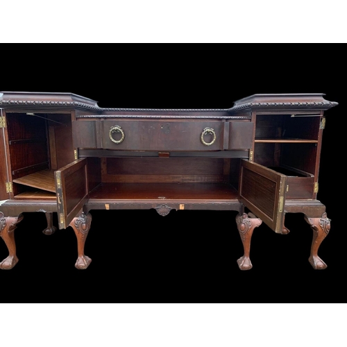 989 - A large early 20th century Chippendale style mahogany sideboard. Circa 1930. 203 x 62 x 109cm.