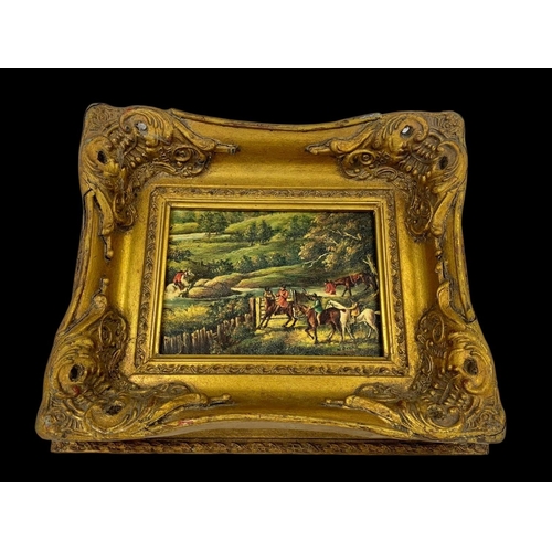 99 - An oil painting in an ornate gilt frame. 35 x 8 x 29.5cm including frame.