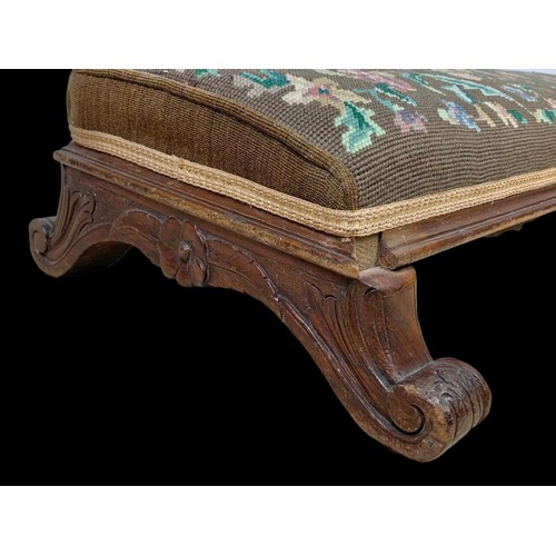 859a - A Victorian tapestry top mahogany footstool. Circa 1870. 92 x 41 x 19cm.