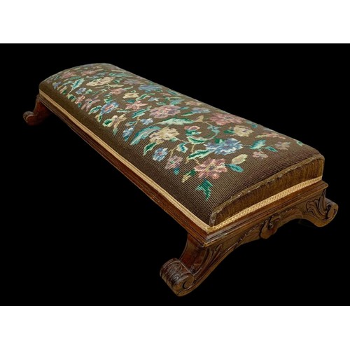 859a - A Victorian tapestry top mahogany footstool. Circa 1870. 92 x 41 x 19cm.