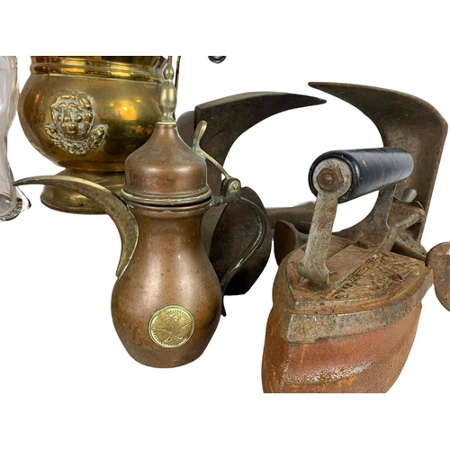 223 - Sundry lot. Including vintage copper and brassware, 2 shoe lasts, Edwardian iron and an oil lamp. La... 