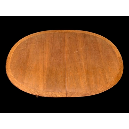 1014 - A Nathan Furniture teak extending dining table. Mid century. Circa 1970. Extended 174.5 x 91 x 74cm.