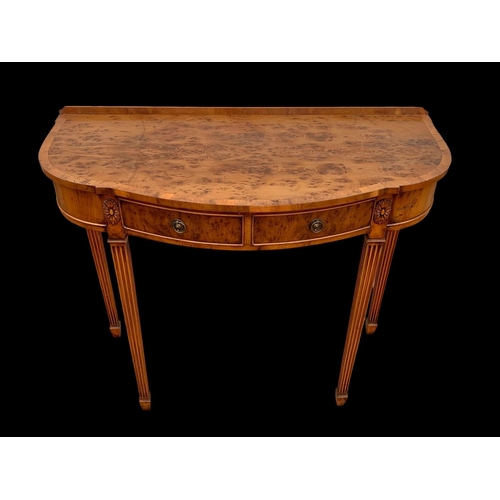 1020 - A Yew wood 2 drawer hall table. 91 x 42 x 78cm.