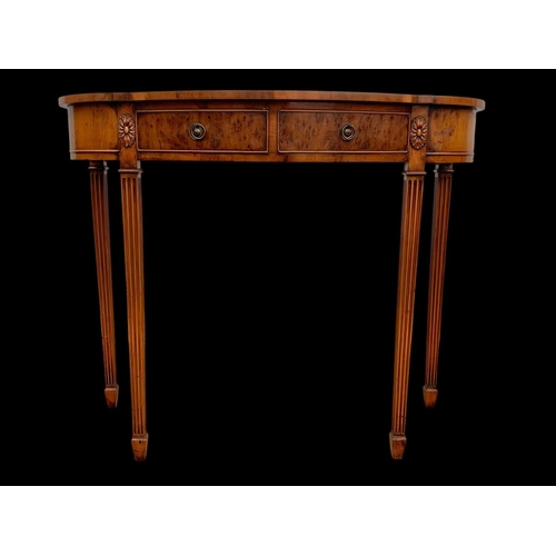 1020 - A Yew wood 2 drawer hall table. 91 x 42 x 78cm.