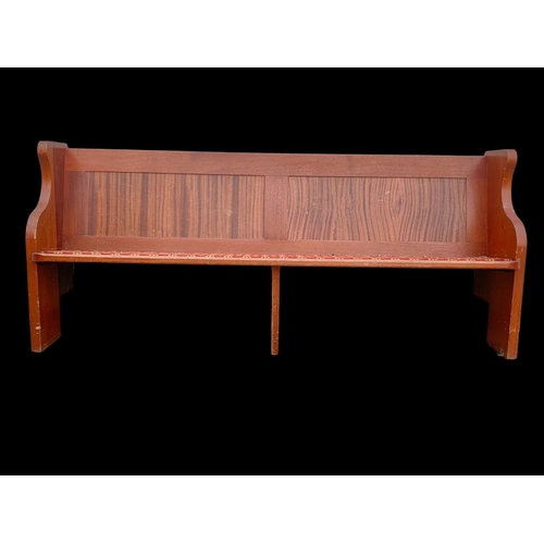 1033 - A large vintage pine church pew/bench. 204.5cm.