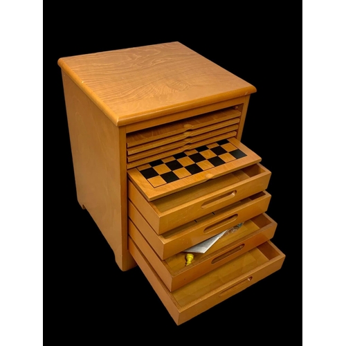 197 - A games chest with contents. 35.5 x 33 x 47cm.