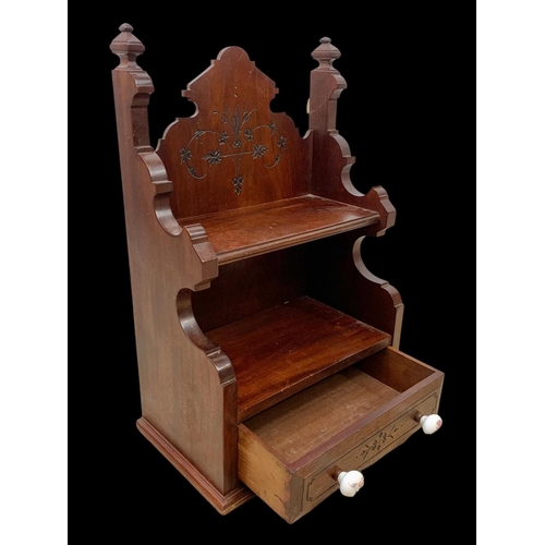 203 - A late Victorian walnut wall bracket with drawer. Circa 1900. 42 x 24 x 61cm.