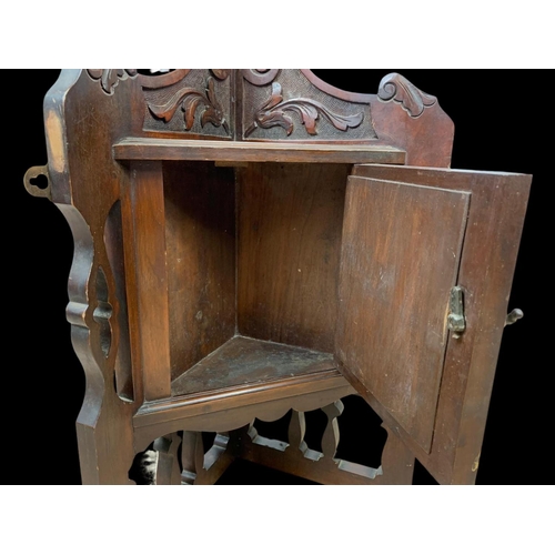 206 - An Edwardian corner wall bracket. 40 x 62.5cm.