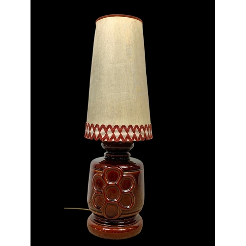 212 - A large West German pottery lamp. Base measures 27 x 45cm. Shade measures 51cm.