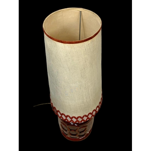 212 - A large West German pottery lamp. Base measures 27 x 45cm. Shade measures 51cm.