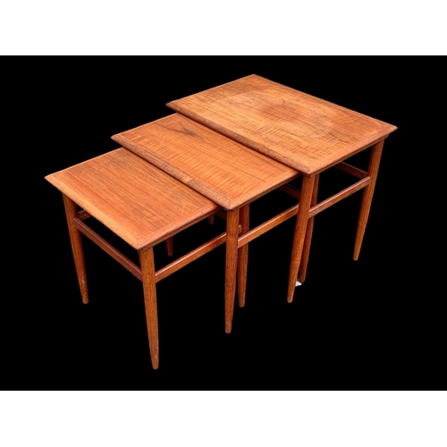 833 - A Danish teak nest of tables designed by Kai Kristiansen. Denmark. Mid century. Circa 1960.