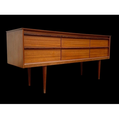 838 - A teak 4 drawer sideboard by Austinsuite. Mid century. Circa 1960’s. 145.5 x 43 x 66cm.