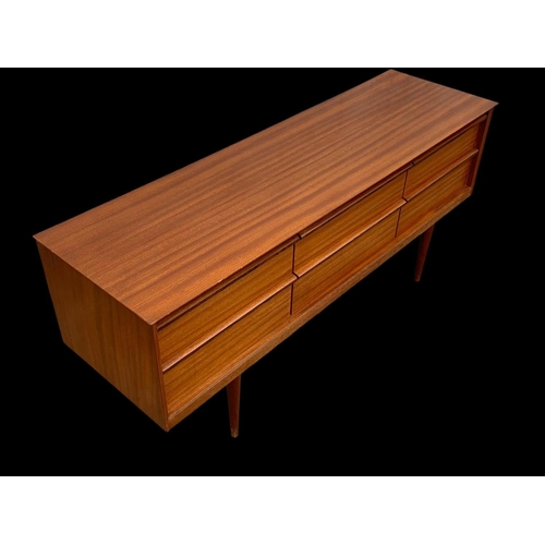 838 - A teak 4 drawer sideboard by Austinsuite. Mid century. Circa 1960’s. 145.5 x 43 x 66cm.