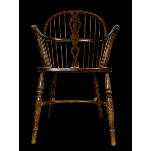 888 - An early 20th century elm and beech Windsor armchair. In the 18th century style. Circa 1900-1920. 52... 