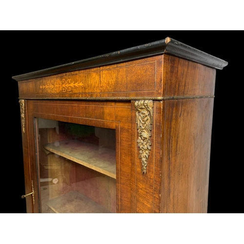 892 - A Victorian inlaid walnut pier cabinet with brass ormolu mounts. Circa 1860. 76 x 29.5 x 94cm.