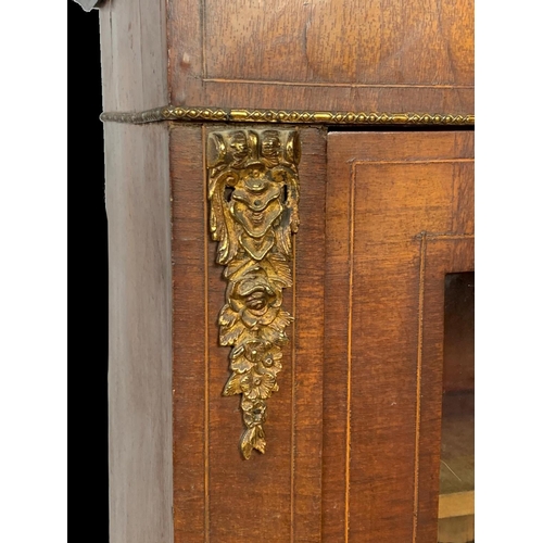 892 - A Victorian inlaid walnut pier cabinet with brass ormolu mounts. Circa 1860. 76 x 29.5 x 94cm.