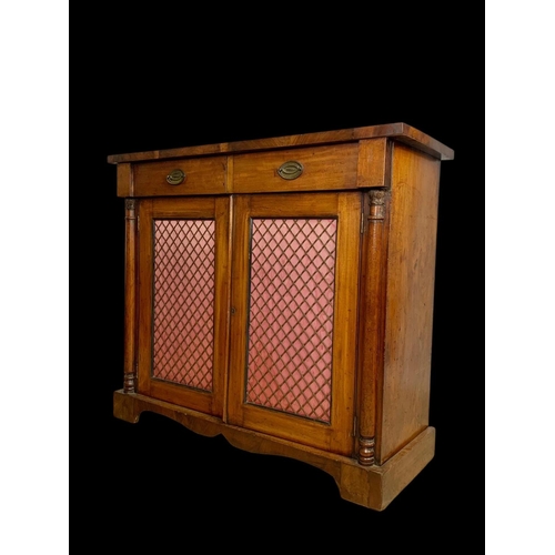 893 - A mid Victorian mahogany chiffonier cabinet with 2 drawers and bras mesh cupboard doors. Circa 1860.... 