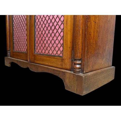 893 - A mid Victorian mahogany chiffonier cabinet with 2 drawers and bras mesh cupboard doors. Circa 1860.... 