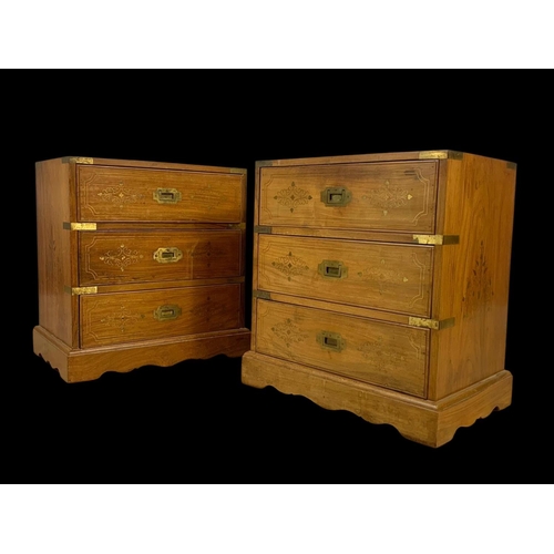 894 - A pair of rosewood campaign style brass inlaid 3 drawer bedsides. 49 x 33 x 50.5cm